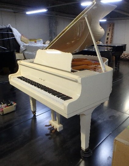 white yamaha grand piano